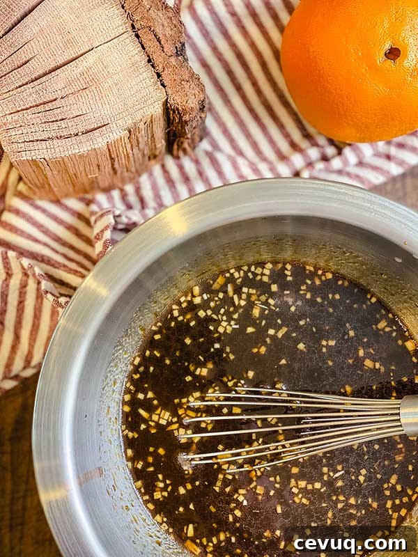 Grilled Bourbon Molasses Marinated Steak Recipe 3 Marinade ingredients whisked together in a metal bowl