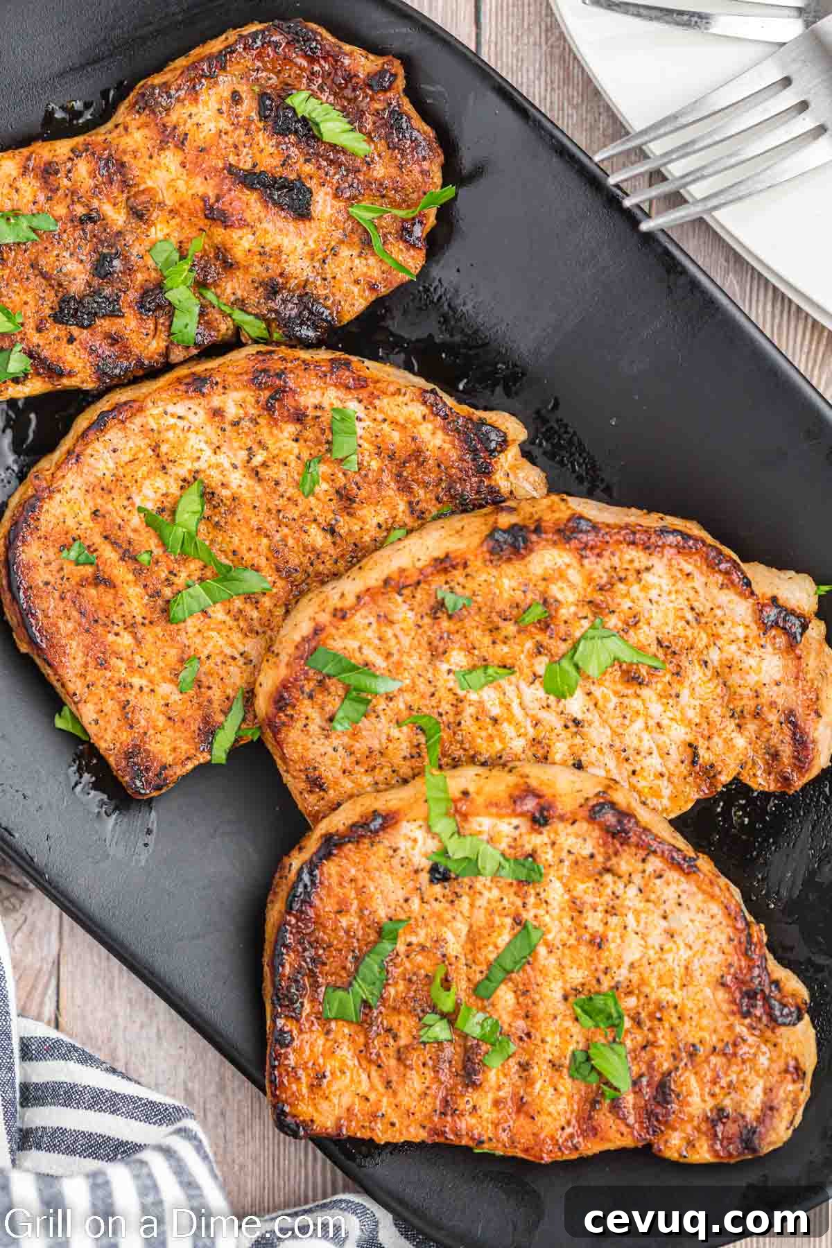 Grilled Boneless pork chops on a platter