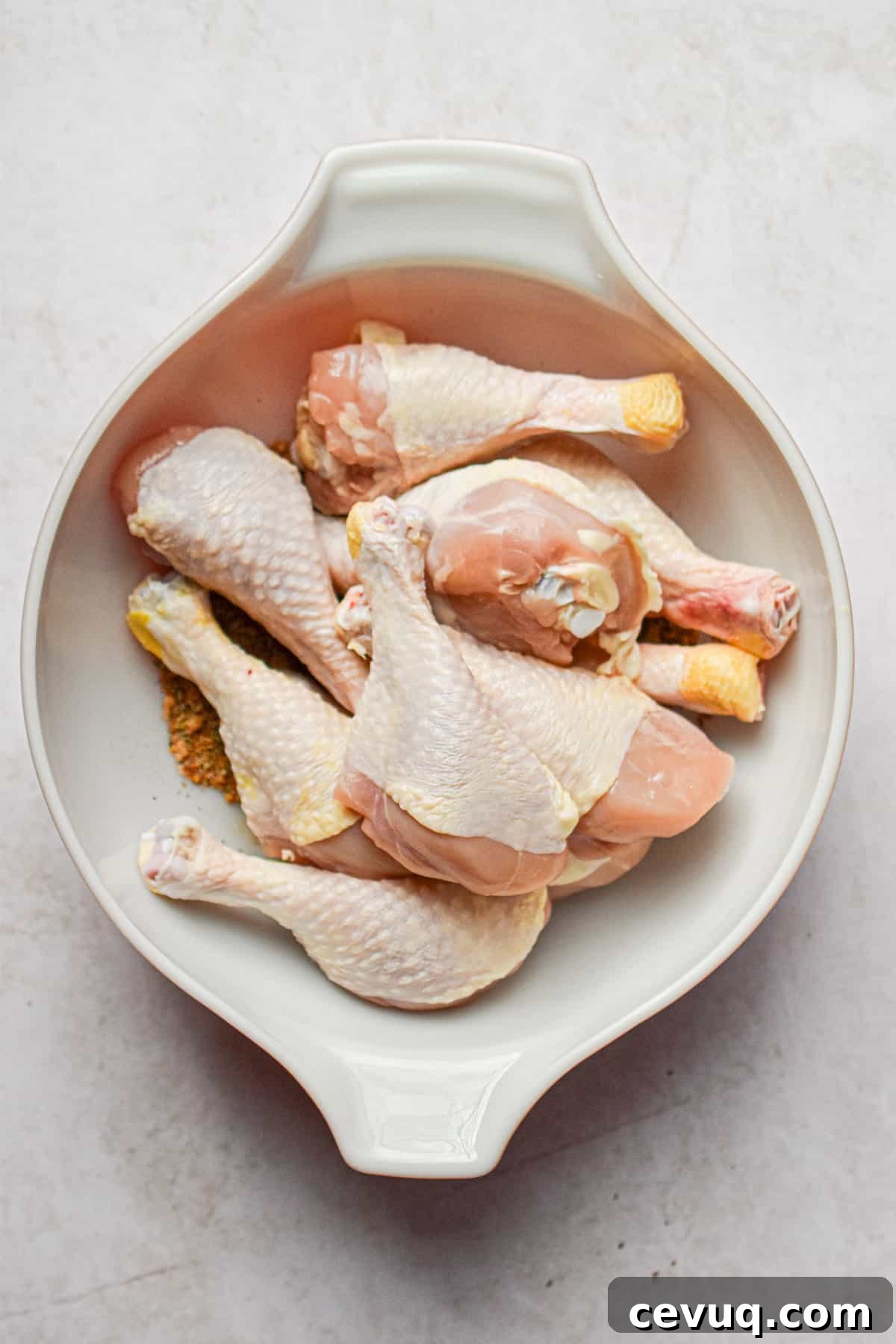 Tender, Juicy Instant Pot Chicken Drumsticks Recipe 5 The chicken is added to the large mixing bowl.