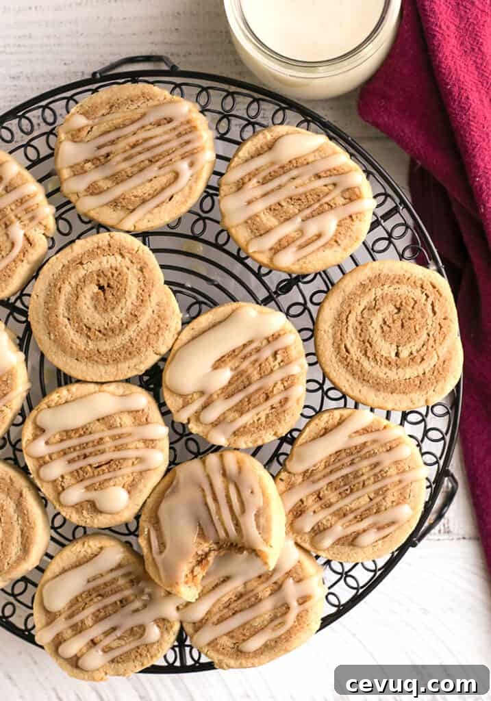 top shot of paleo cinnamon roll cookies. Some with glaze and some plain
