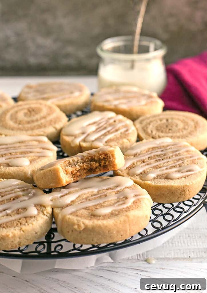 paleo cinnamon roll cookies on a cooling rack 
