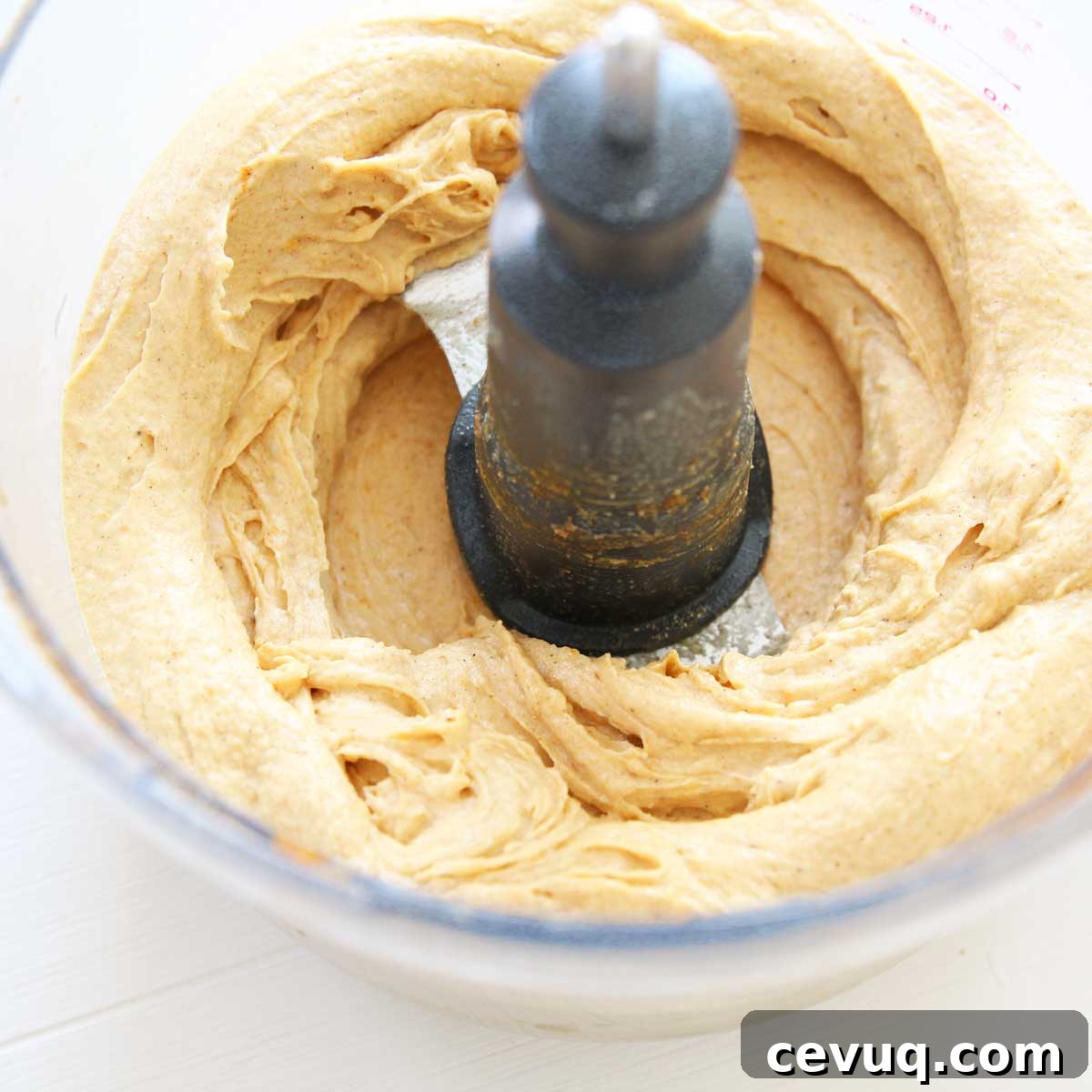 pouring mixture into freezer container