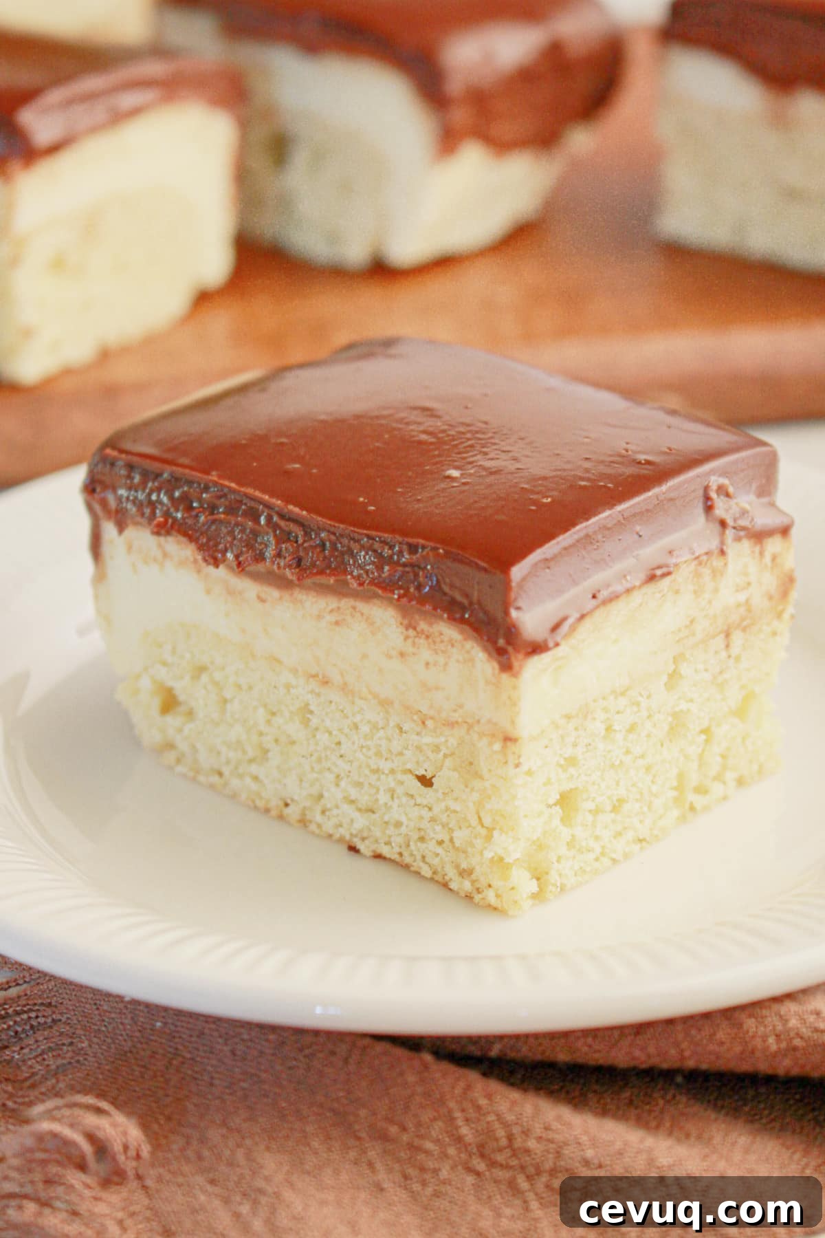 Boston cream bar on a small plate.