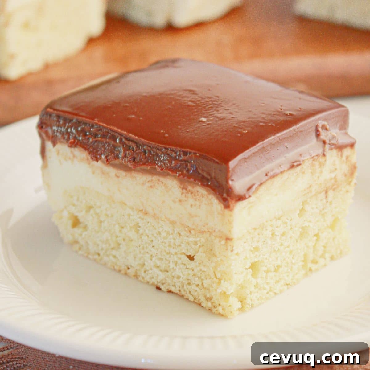 Boston cream bar on a small plate.