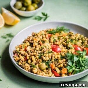 pearl couscous and lentil salad with tomatoes parsley olive