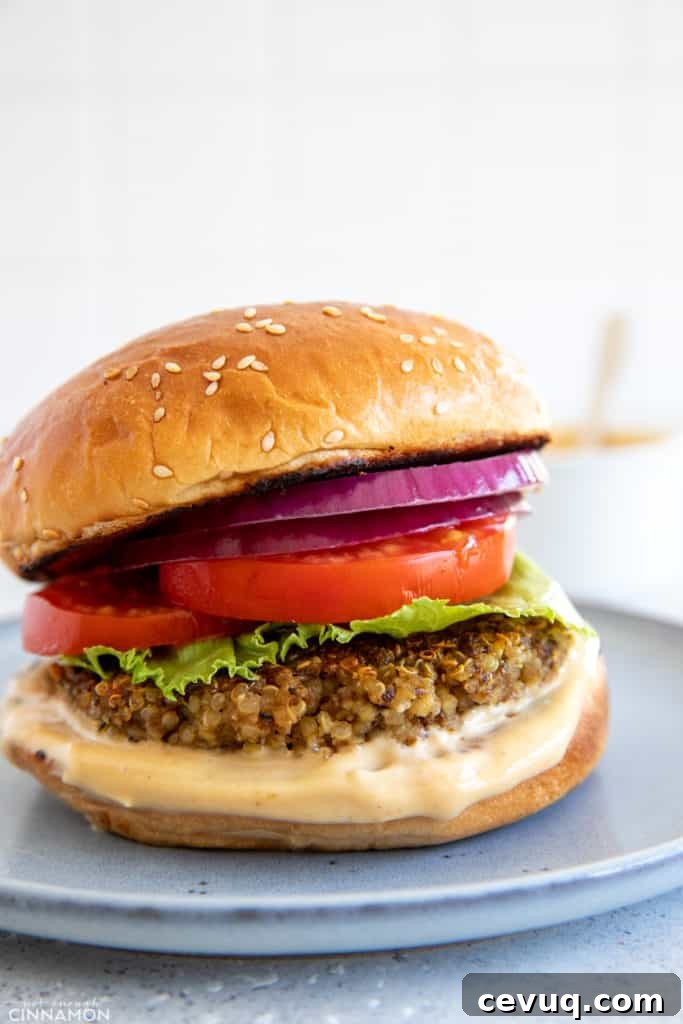 Shiitake Quinoa Mushroom Burger with Miso Aioli on a small plate 