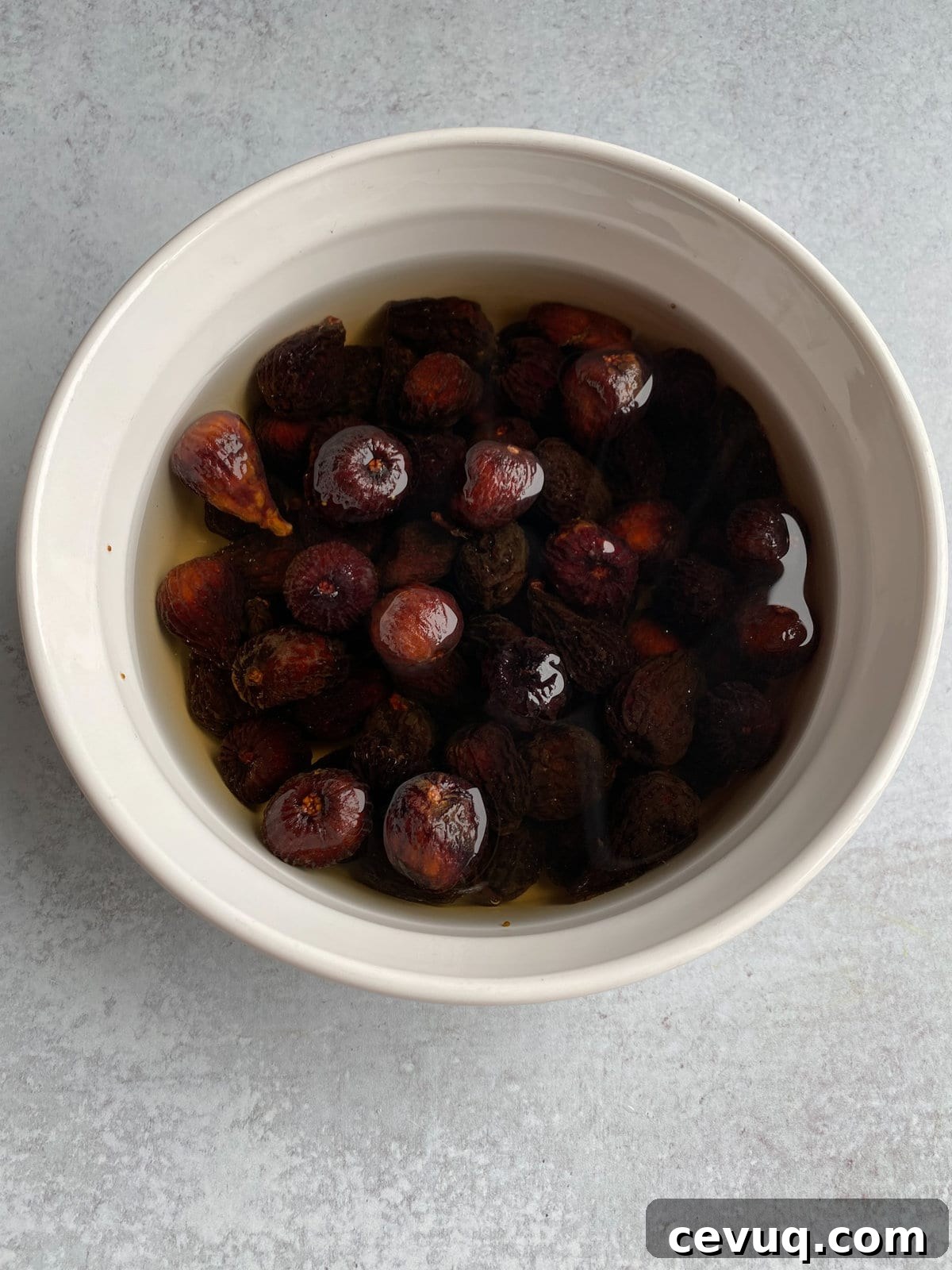 Figs soaking in water to make Italian fig cookies.