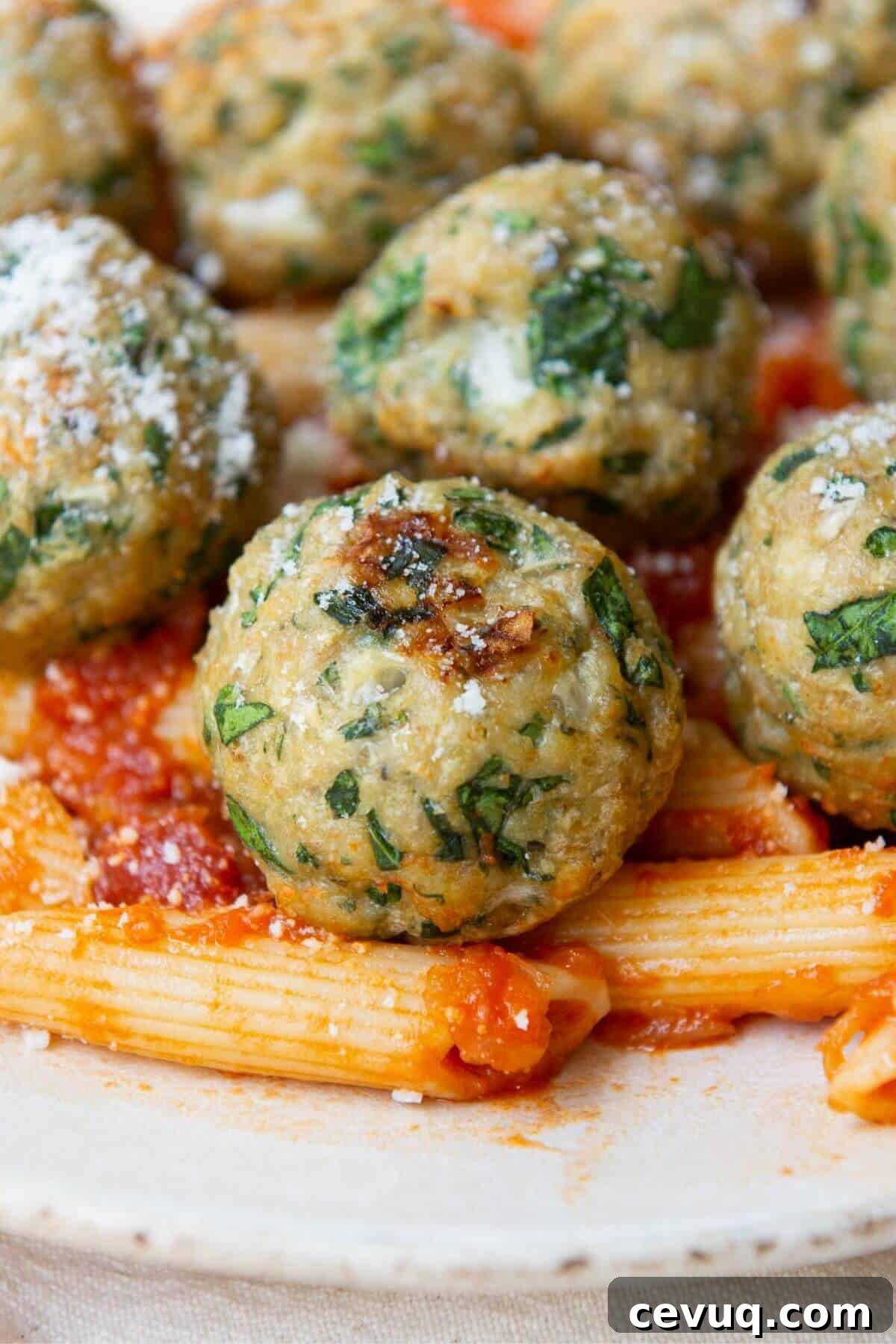 Juiciest air fryer chicken meatballs on a plate.