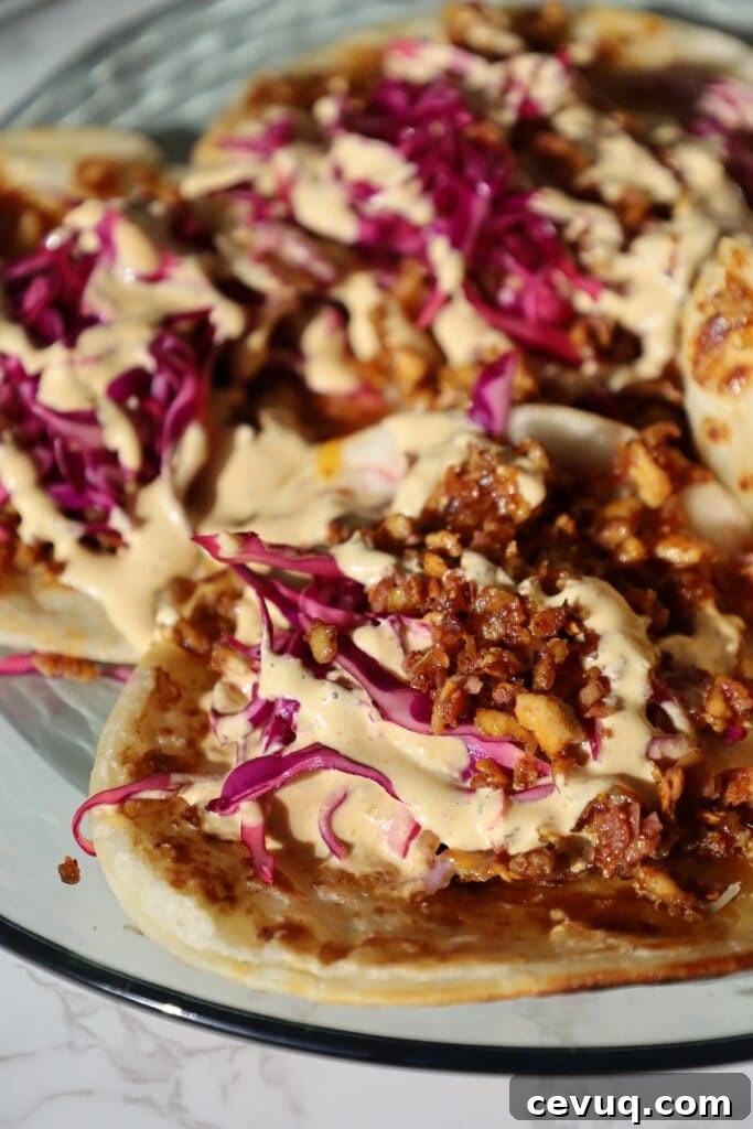 Shredded tofu tacos on a plate