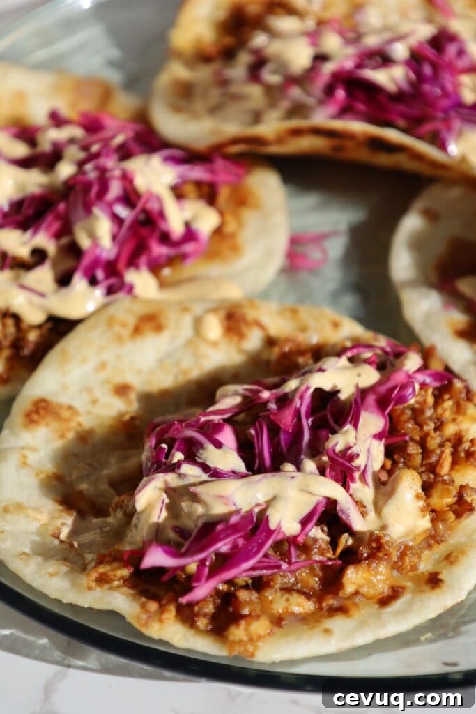 Plated shredded tofu tacos