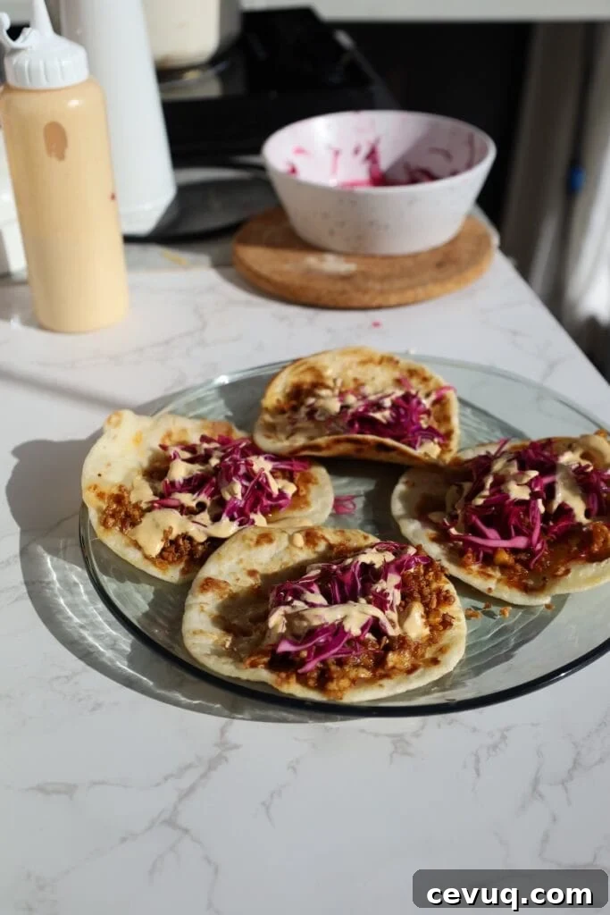 Shredded tofu tacos with garnishes