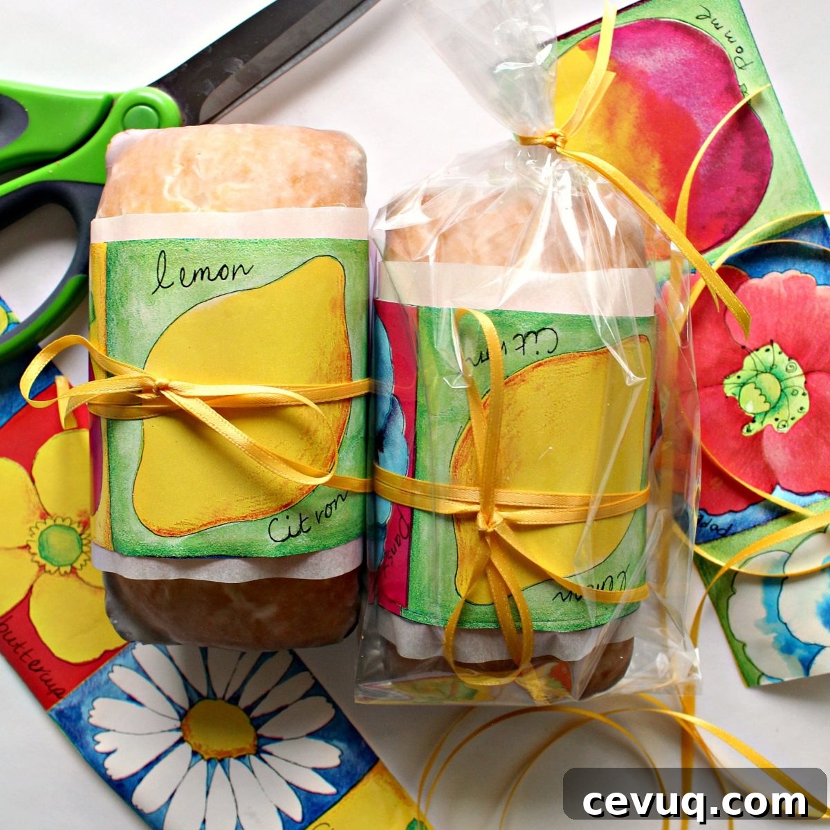 Two mini loaves wrapped for gifting with wrapping paper and ribbon.