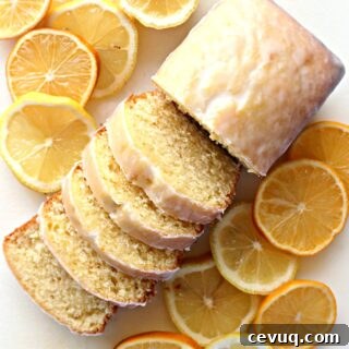 Iced Lemon Loaf sliced to show soft, dense interior.